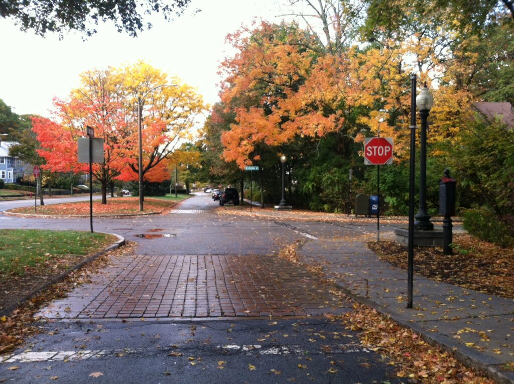 At our request, the STOP sign was moved up to the intersection. This was much safer.